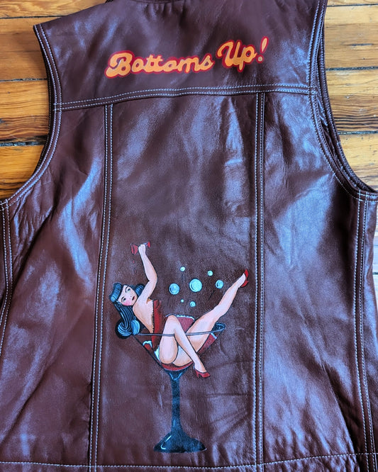 Hand-painted 'Bottoms Up' leather vest with tattoo art